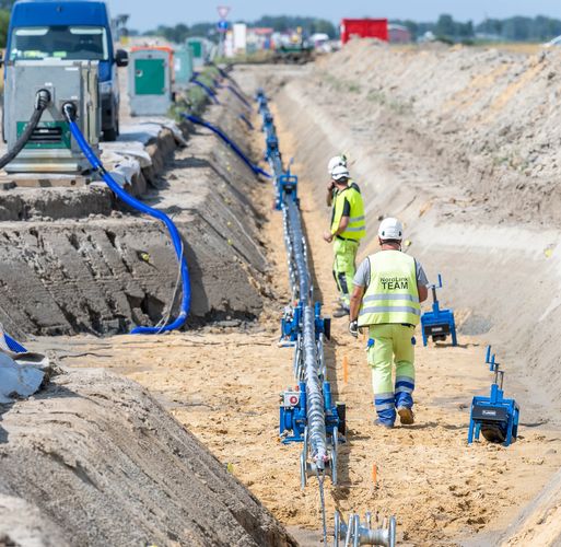 HV cable laying with construction workers