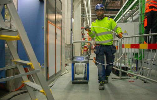 Image of NKT engineer with a cable