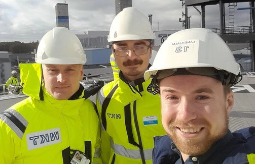 employees working safely with helmet outdoor