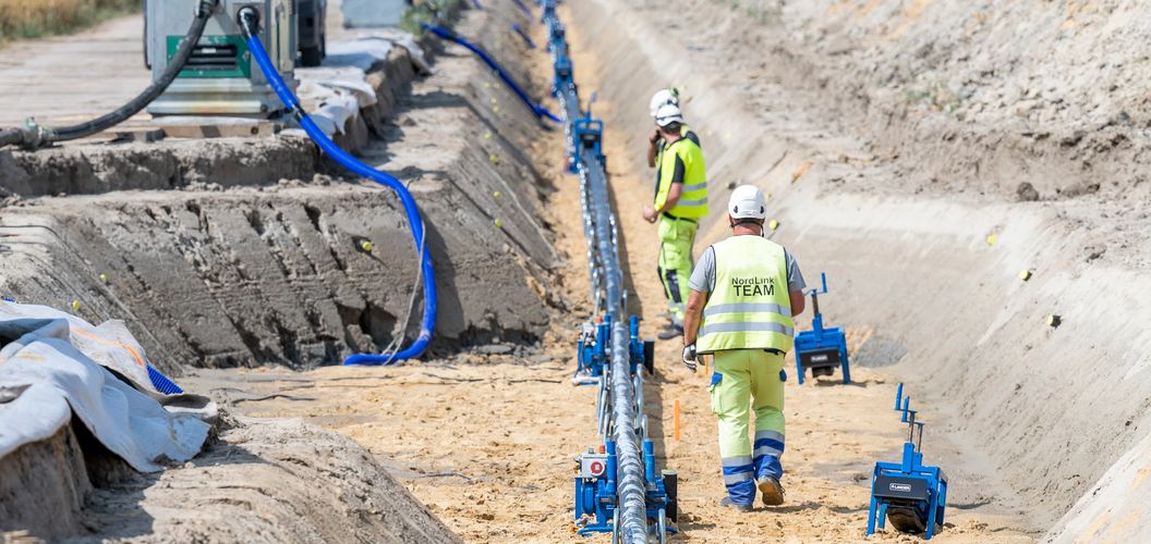 HV cable laying with construction workers